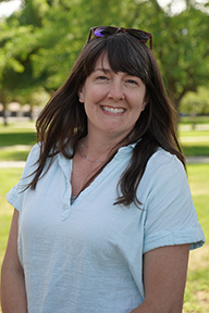 Portrait of Julie Fitch standing outside
