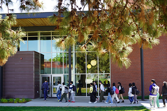 The 2025 Misawa delegation walks toward the WVC Music and Art Center